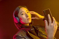 Woman wearing black wireless headphones 