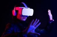 Woman playing a virtual video game on virtual screen