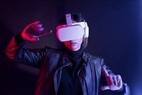 Woman having virtual reality experience using VR headset