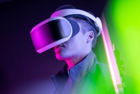 Gamer with VR headset entertainment technology