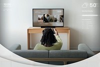 Woman watching movie in the living room