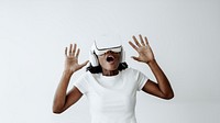 African American  woman experiencing VR simulation