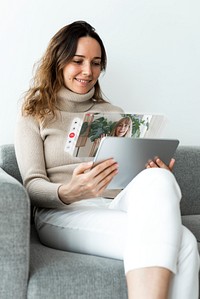 Woman using tablet for video call