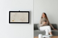 Home automation panel monitor mockup psd on a wall