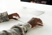 Military officer using computer army technology