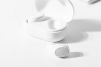 White wireless earbuds with case