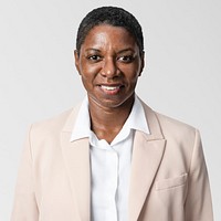 Smiling African American woman in beige shirt portrait