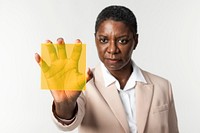 Woman presenting yellow transparent plate smart technology