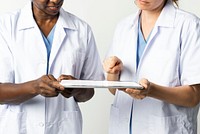 Doctors using tablet to diagnose medical technology