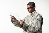Female soldier using transparent tablet military technology