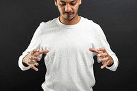 Man showing invisible object hand gesture