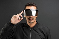 Man wearing black shield glasses