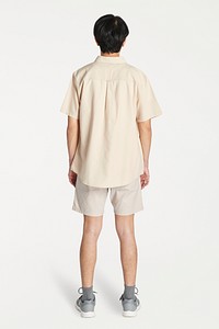 Men mockup in casual cream t-shirt and shorts rear view