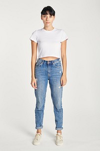 Women&#39;s white crop top and jeans