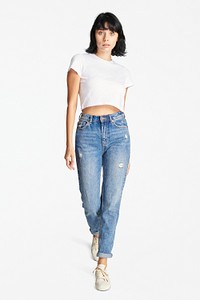 Women&#39;s white crop top and high waisted jeans full body mockup 