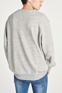 Rear view of an Asian man wearing a gray sweatshirt 
