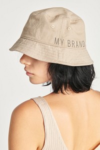 Woman in a beige bucket hat template mockup