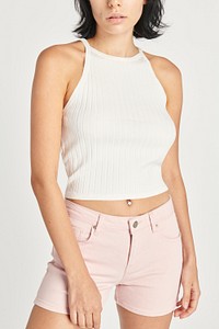 Womens&#39; white cropped top with pink jeans psd mockup