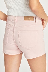 Woman in baby pink shorts mockup 