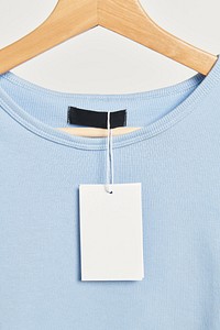 T-shirt with a blank tag on a wooden hanger