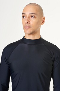 Man in a black long sleeved swimming top
