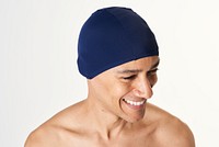 Man wearing a navy blue swimming cap 