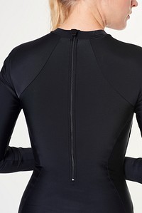 Back view woman in long sleeved wetsuit