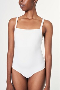 Black woman wearing a white bodysuit 