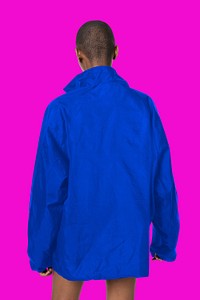 Black woman wearing a blue waterproof jacket mockup 
