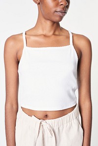 Black woman in cropped tank top summer outfit