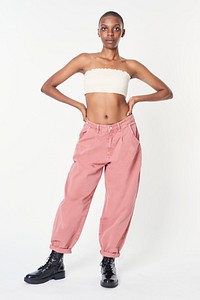 Black woman in pink jeans and a white bandeau top mockup