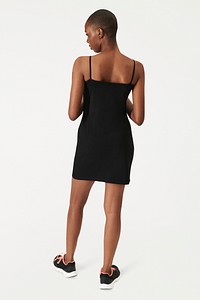 Black woman in a black dress mockup psd rear view