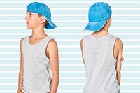 Boy's gray tank top with blue cap in studio