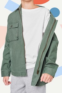 Boy wearing green jacket in studio