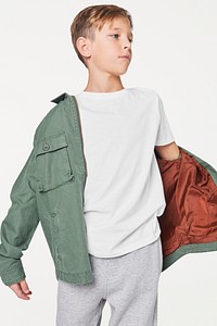 Boy's green jacket mockup psd in studio