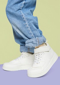 Kid wearing jeans psd white sneakers mockup minimal fashion