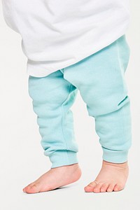 Child in sweat pants with barefoot