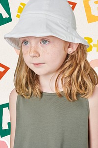 Girl wearing tank top and bucket hat