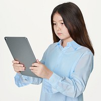 Girl using digital tablet in studio