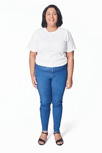 Women&#39;s white t-shirt and jeans size inclusive fashion studio shot