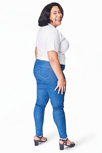 Plus size women&#39;s white t-shirt and jeans fashion studio shot