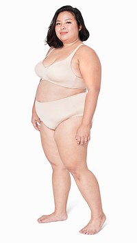 Psd size inclusive women&#39;s beige lingerie mockup studio shot