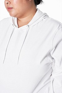 Women&#39;s white hoodie mockup fashion shoot in studio
