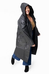 Women&#39;s black raincoat mockup fashion shoot in studio
