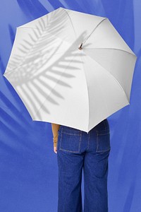 Woman holding umbrella psd studio shot