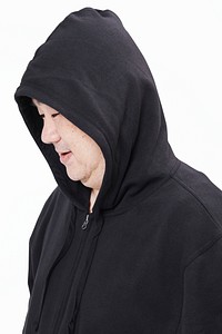 Men&#39;s black hoodie mockup fashion shoot in studio
