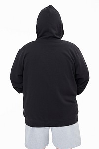 Men&#39;s black hoodie mockup fashion shoot in studio