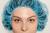 Woman getting plastic surgery at beauty clinic