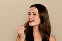 Woman putting on red lipstick, cosmetic & beauty