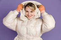 Blonde woman in white down jacket, winter outfit 